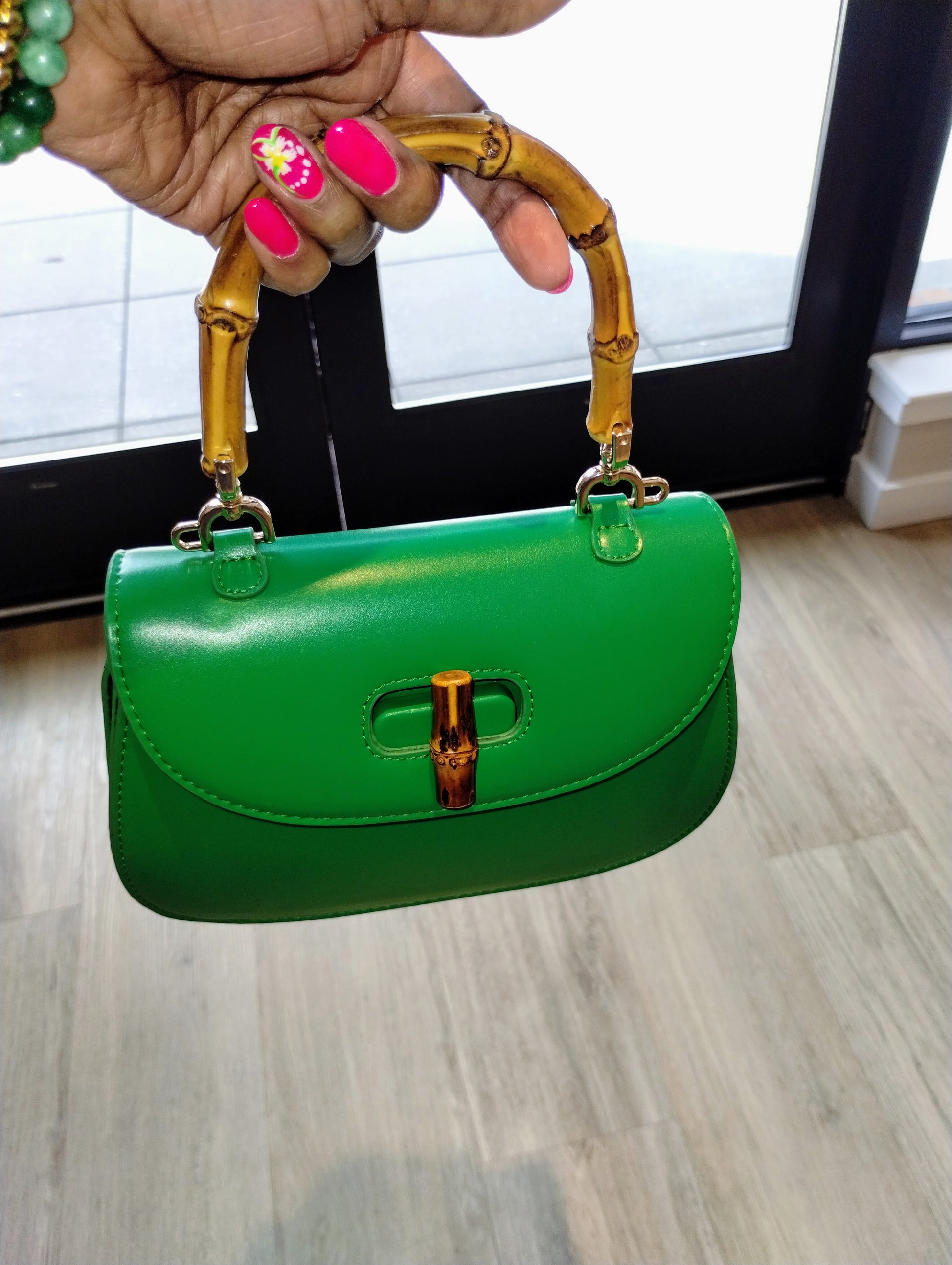 green vegan leather handbag
